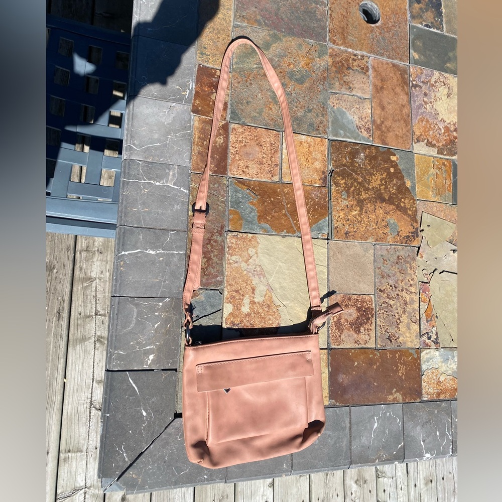 Fairly used, all zippers work leather in good condition.